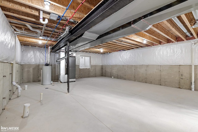 basement with heating unit and gas water heater