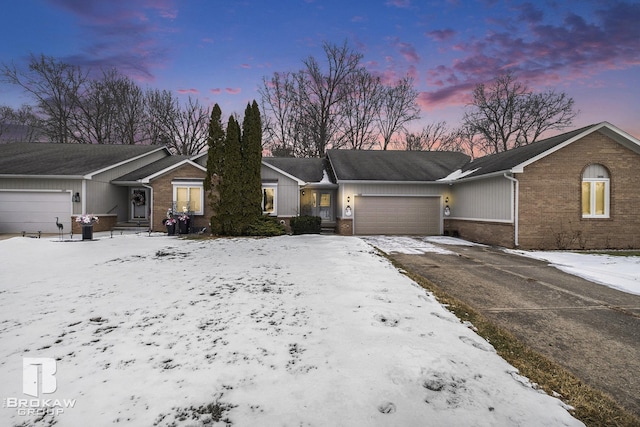 single story home featuring a garage