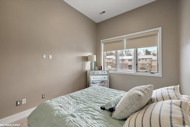 bedroom featuring carpet