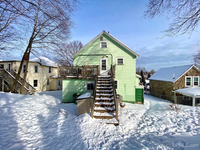 view of front of house featuring a wooden deck