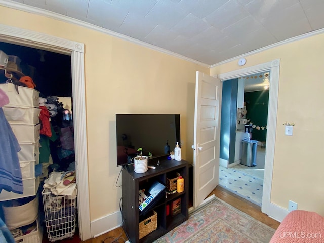 bedroom with ornamental molding