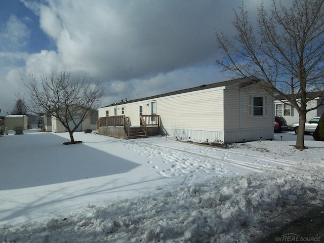 view of snow covered property