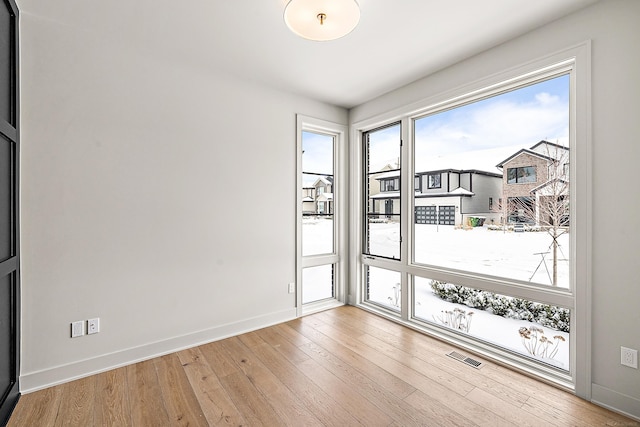 empty room featuring hardwood / wood-style floors