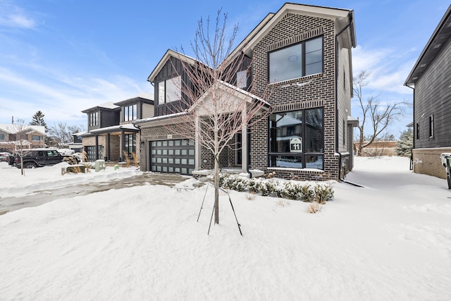 view of front of property with a garage