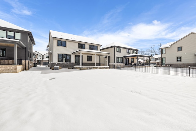 view of snow covered house