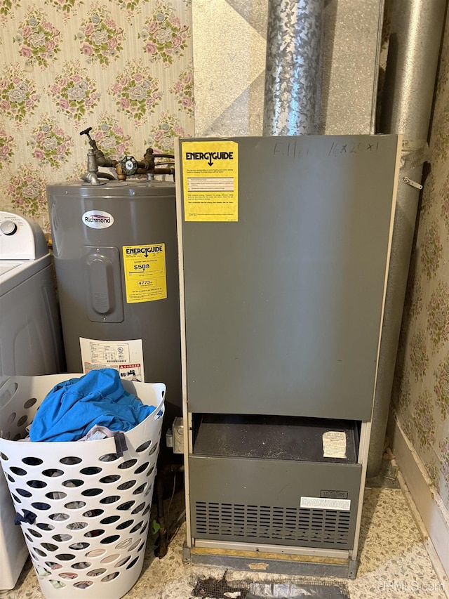 utility room featuring washer / clothes dryer and water heater