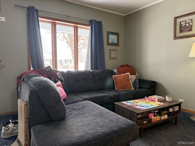 carpeted living room featuring ornamental molding