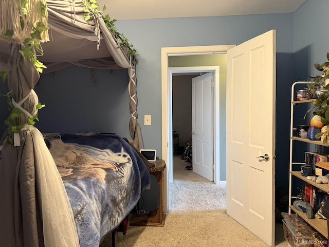 bedroom with light carpet