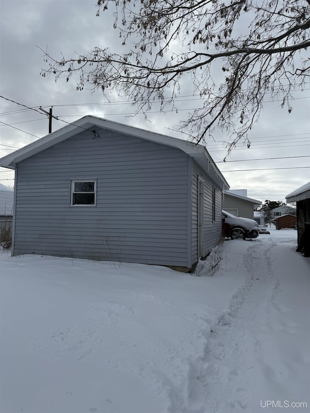 view of snow covered property