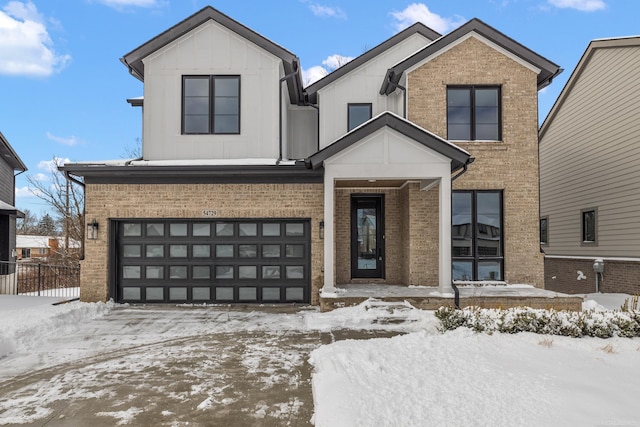 view of front of property with a garage