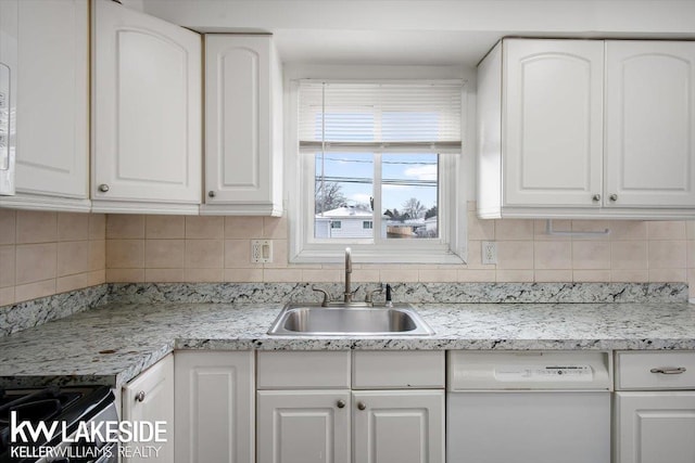 kitchen with white cabinetry and dishwasher