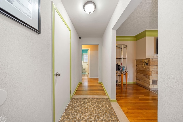 hall featuring wood-type flooring