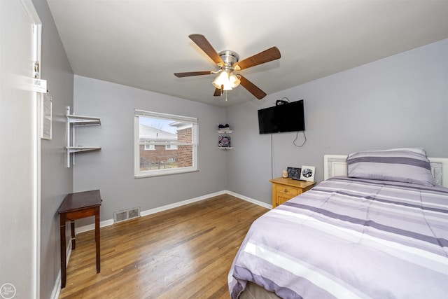 bedroom featuring ceiling fan and light hardwood / wood-style floors