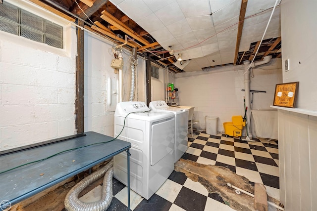 washroom featuring washing machine and dryer