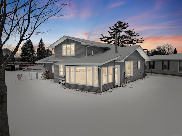 view of snow covered property