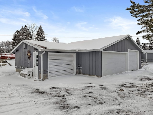 view of snow covered garage