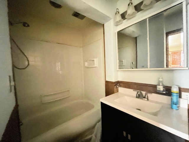 bathroom featuring vanity and shower / washtub combination