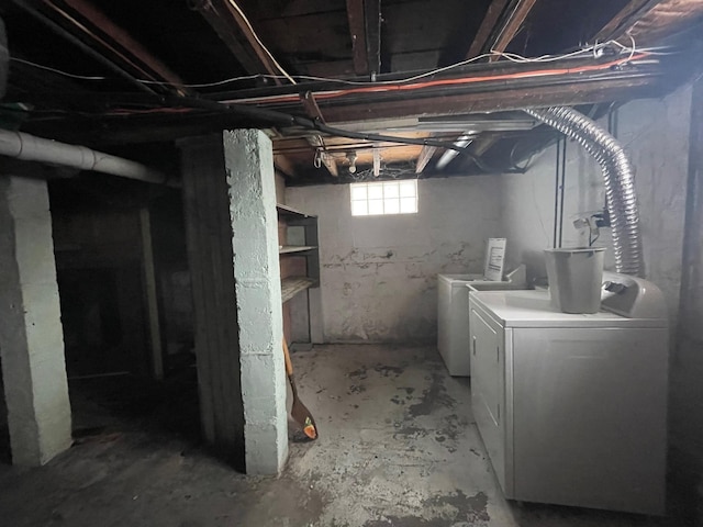 basement with separate washer and dryer