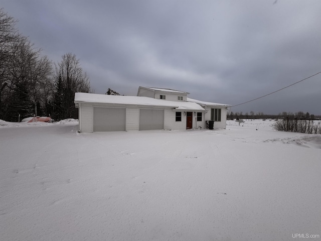 view of front of property featuring a garage