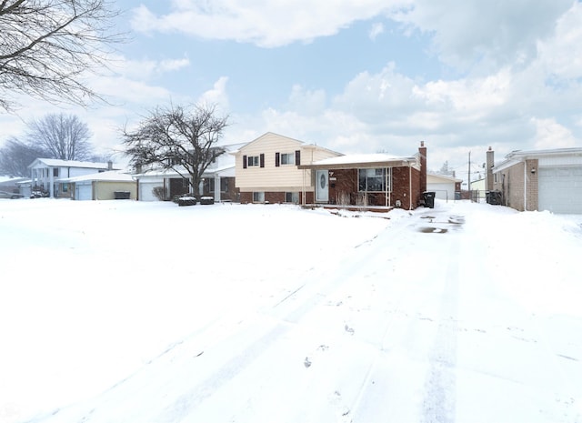 split level home with a garage