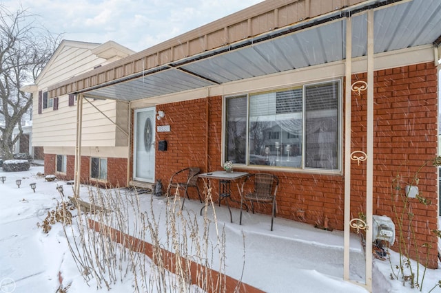 view of snow covered property