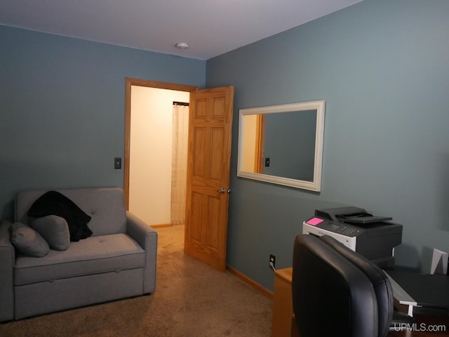 office area featuring light colored carpet