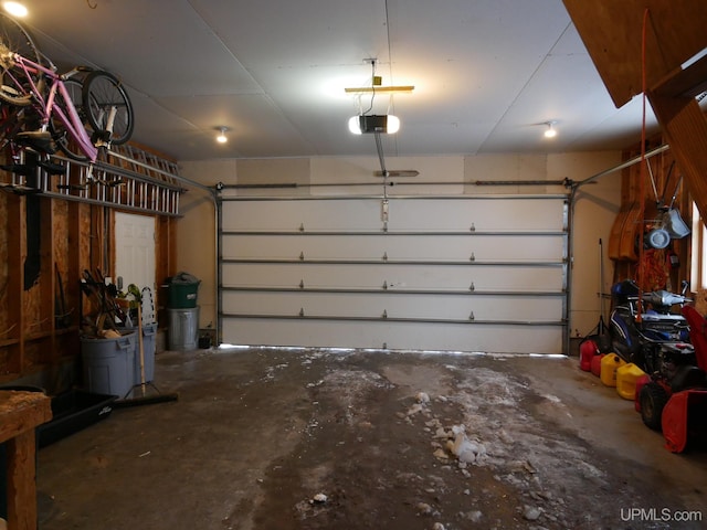 garage featuring a garage door opener