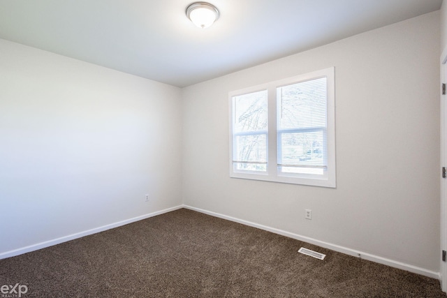 spare room with carpet