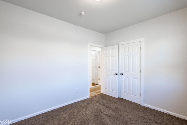 unfurnished bedroom featuring carpet floors