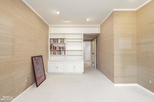 hall featuring crown molding and light colored carpet