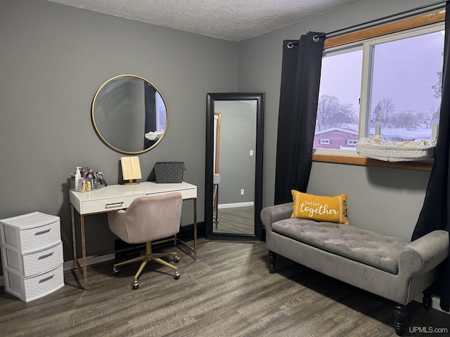 office space featuring dark hardwood / wood-style flooring and a textured ceiling