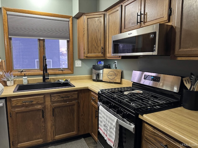 kitchen featuring appliances with stainless steel finishes and sink