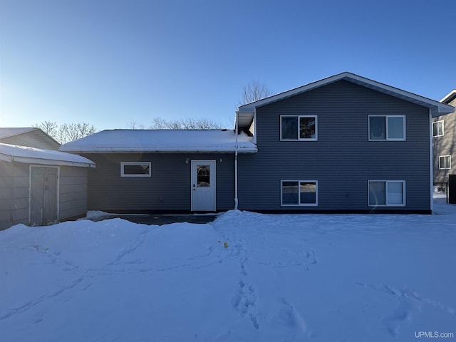 view of snow covered property