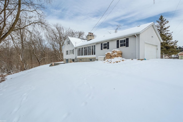 view of front of property with a garage