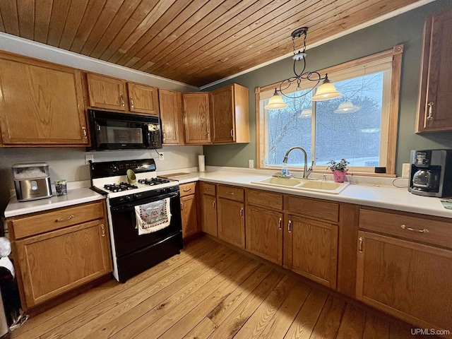 kitchen featuring range with gas stovetop, pendant lighting, wooden ceiling, sink, and light wood-type flooring