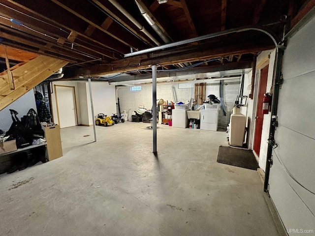 basement featuring separate washer and dryer