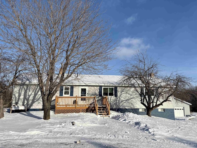 view of front of property with a wooden deck