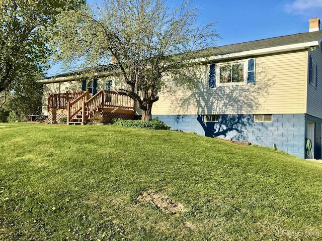 view of yard with a wooden deck