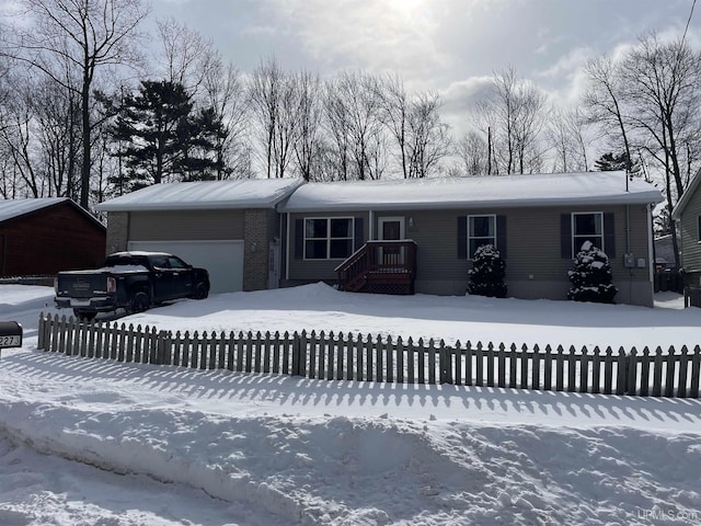 view of front of home with a garage