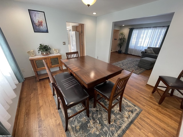 dining area with light wood-type flooring