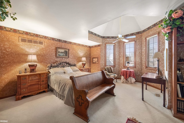 bedroom with vaulted ceiling and carpet