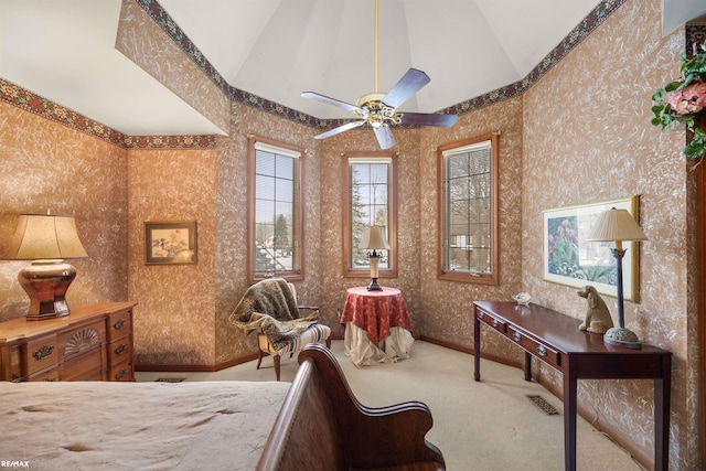 carpeted bedroom with lofted ceiling