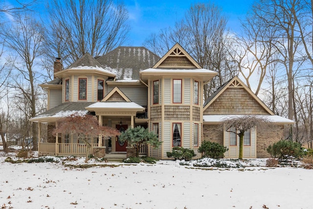 victorian home featuring covered porch