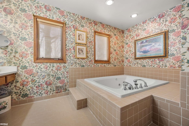 bathroom featuring tile patterned flooring and a relaxing tiled tub