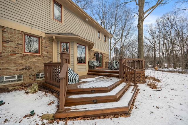 view of snow covered deck