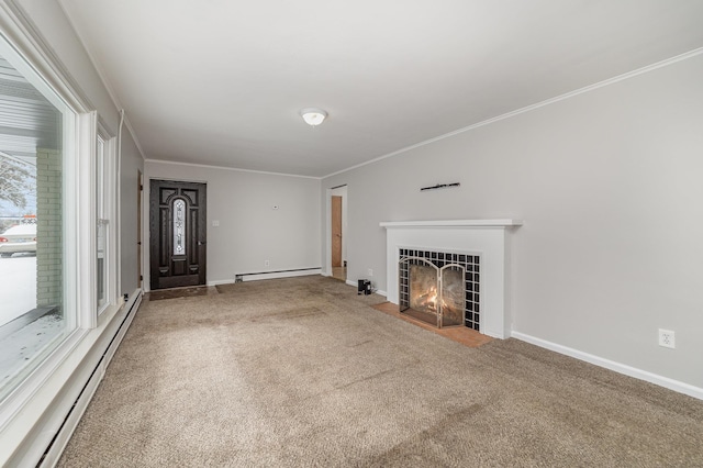 unfurnished living room with carpet, a tiled fireplace, ornamental molding, and baseboard heating