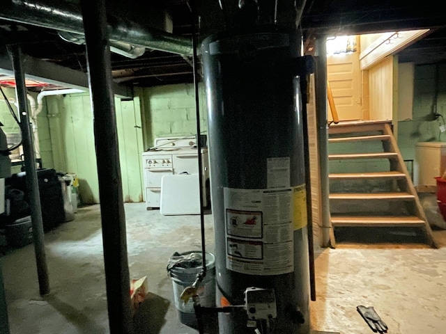 basement featuring washer / dryer and gas water heater