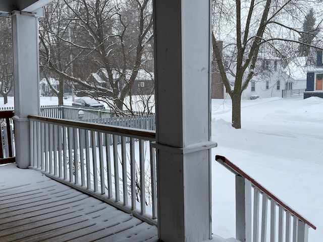 view of snow covered deck