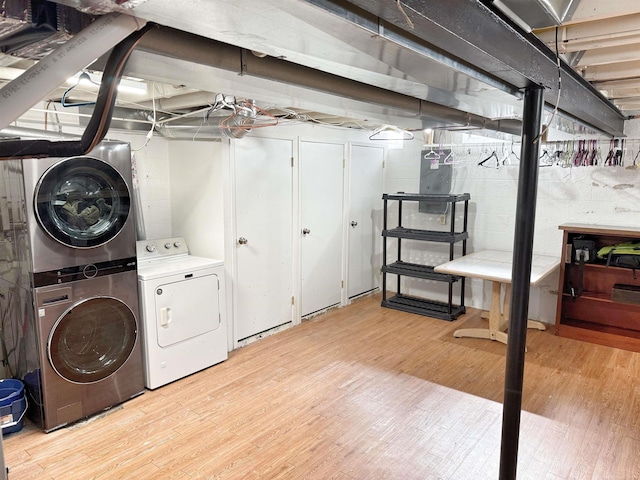 laundry area featuring light wood-type flooring