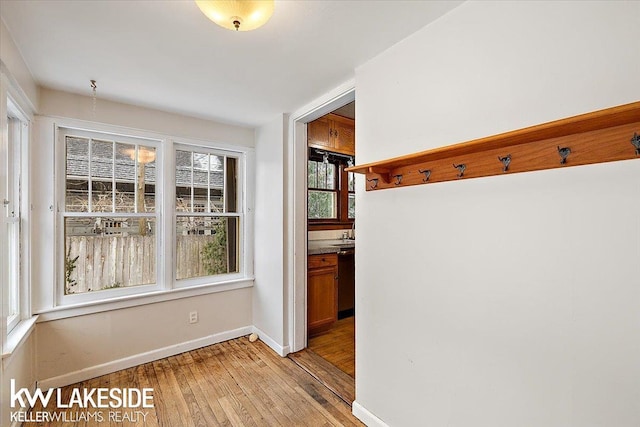 unfurnished dining area with light hardwood / wood-style floors